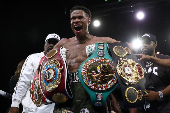 Unbeaten Devin Haney with the spoils of victory.