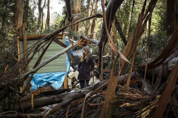Michaela Pascoe surveys the damage at her bed-and-breakfast property in Mount Dandenong.