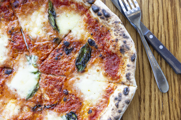 This stylish Richmond newcomer boasts Milan supermodel looks, but are its Naples-style pizzas the goods?