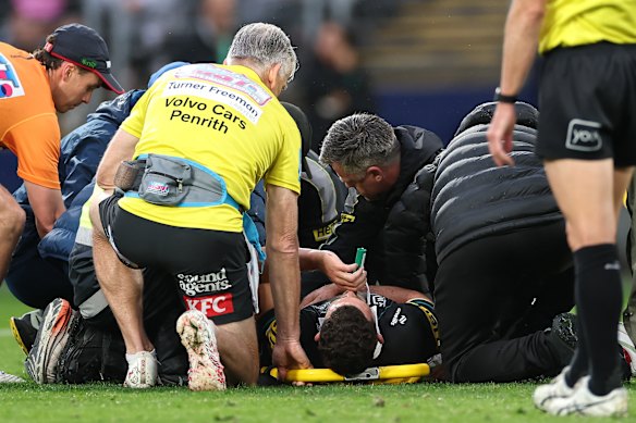 Penrith medical staff attend to Nathan Cleary.
