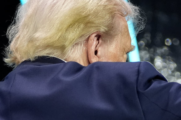 Trump appears without his bandage as FBI confirms he was struck by a bullet