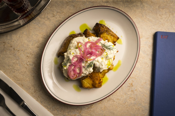 Gzik is a dish of smashed potatoes, fresh sour cheese, radish and cucumber.