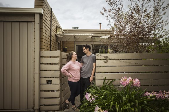 Rebecca and Jordan Smith outside their recently purchased three-bedroom townhouse in Ringwood East.