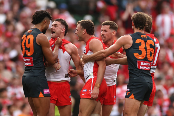 Connor Idun (left) exchanges words with Tom Papley during the last Sydney derby