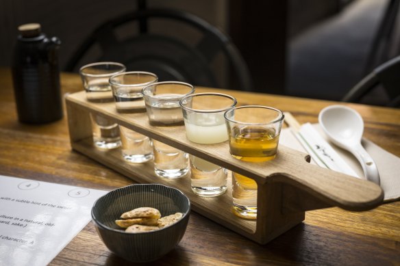 The sake tasting paddle comes with a cheat sheet.