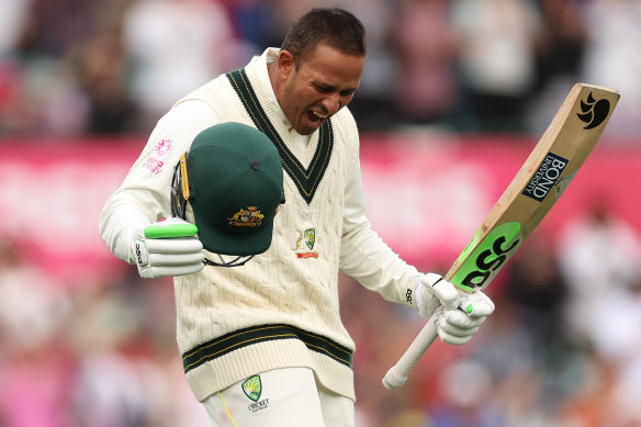 Usman Khawaja celebrates his third successive Test hundred at the SCG during the Sydney Test