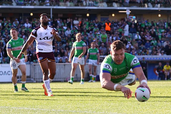 Hudson Young scores a try against Brisbane on Sunday.
