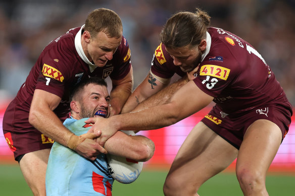 James Tedesco takes the ball dead to save a try. 