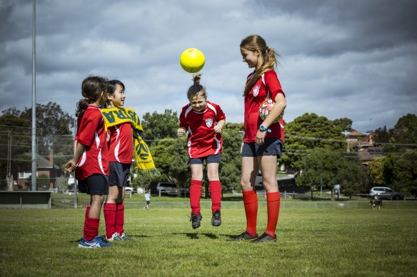 Members of the Darebin Falcons - l-r Willow, Colette, Greta and Artie - are getting ready to cheer on the Socceroos in their knockout game against Argentina at the 2022 World Cup. 