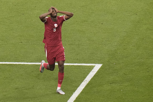 Qatar’s Mohammed Muntari reacts during the World Cup group A soccer match against Ecuador.