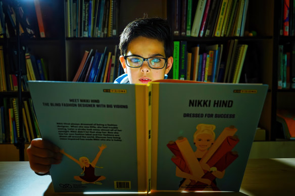 Mikail Liakos, 12, lives with low vision due to congenital glaucoma and reads with Braille.