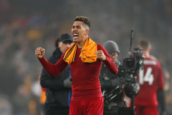 Roberto Firmino, who scored Liverpool's second goal, celebrates after the Reds' win.