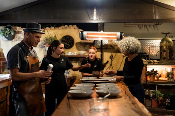 Valerio Fantinelli (left), Rosie Fantinelli (second from left), friend and Anna Tamburri (right) in action during a Flour & Fire dinner.