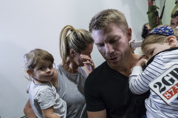 David Warner and his family arrive back in Sydney after the Cape Town ball-tampering affair in 2018.