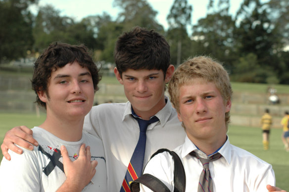  Lech (left), and Dom (right) would attend the funeral of their mate, sportsman and avid Harry Potter fan Hamish (centre), six days after the collision.