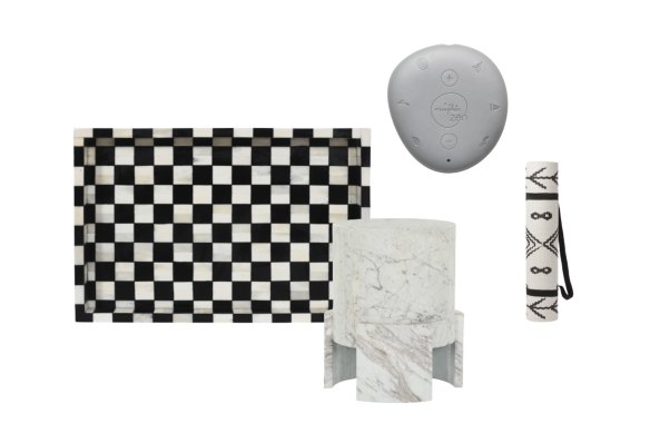 “Checkerboard” bone inlay tray; “Tribeca” side table; “Zen” meditation aid; “Berber Rug” yoga mat.