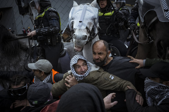 Mounted police tried to stop protesters taking over a major arterial in Southbank.