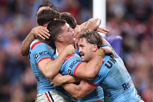 The Rooster’s celebrate Hugo Savala’s try.