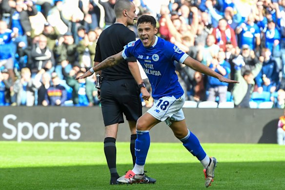 Alex Robertson celebrates a goal for Cardiff City.