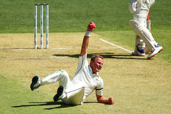 Neil Wagner celebrates after taking a screamer off Warner in Perth.