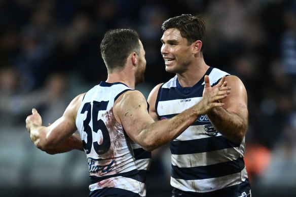 Tom Hawkins is congratulated by Patrick Dangerfield after kicking one of his goals in the Cats’ win.