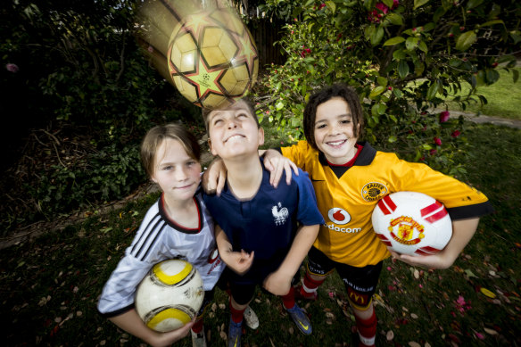 Young soccer fans Orlando Rizzi (blue shirt), 11, Preston Shingange (yellow shirt), 12, and Obi McGregor, 12 from Preston have been keenly following the Matilda’s success.