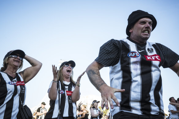 Collingwood fans celebrate after the final siren.