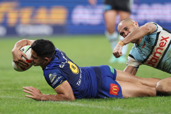 Dylan Brown reaches out to score for the Eels.