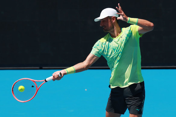Tomic in action at this year’s Australian Open during his qualifying tournament loss.