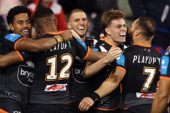 The Tigers moved off the foot of the NRL ladder with their first win at Campbelltown in four years.