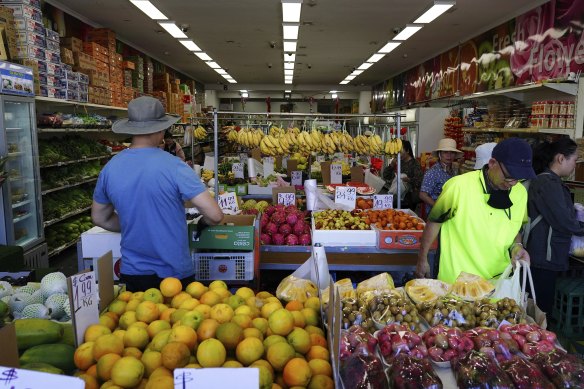 Customers shop at a Vietnamese grocer in St Albans. 