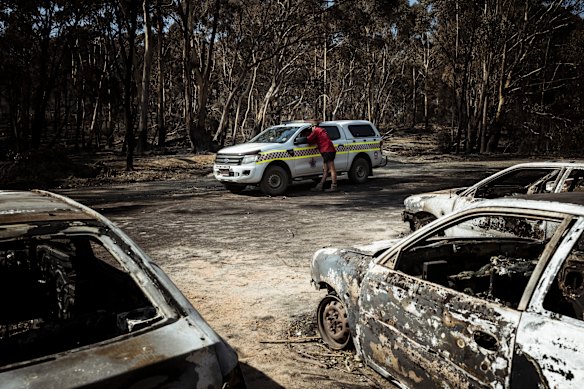 Damage assessment crews arrive at the destroyed Mafeking Rover Park on Thursday.