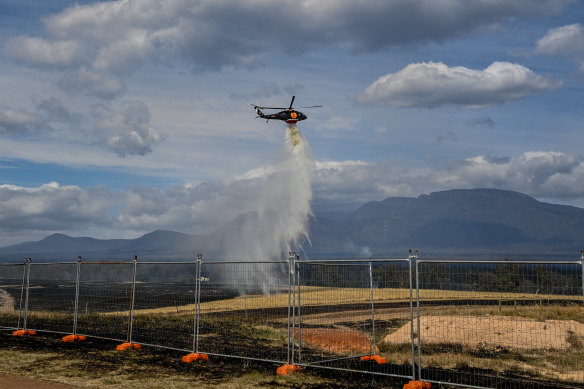 Helicopters put out spot fires on Ken Clark’s property near Pomonal.