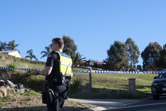 A police officer at the scene of the killing in Darley, Bacchus Marsh, in 2022.