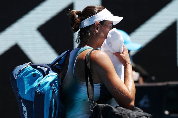 Garbine Muguruza leaves the court after losing to Alize Cornet.