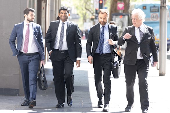 Sharangan Maheswaran, second from left, and his legal team arrive at the ICAC on Friday. 