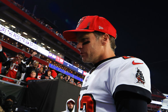 Tom Brady leaves the field after the loss to the Rams.