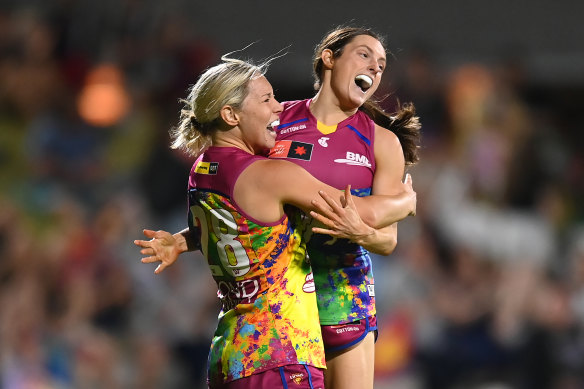 Lions duo Charlotte Mullins and Ruby Svarc celebrate.