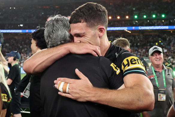 Emotional embrace: Ivan Cleary with son Nathan after Sunday’s grand final win.