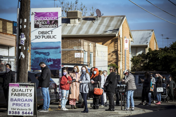 Long queues at Rathdowne Fabrics  in Brunswick, as locals line up to purchase materials to make their own masks.