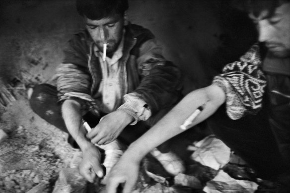 Opium addicts, Kabul, 2006.