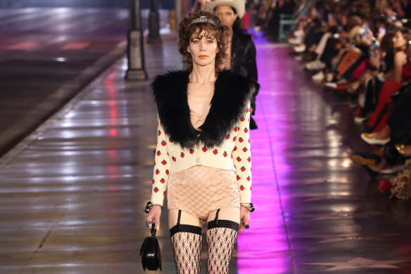 Miranda July walks the runway at the 2021 Gucci Love Parade.