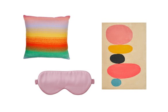 “Morph” cashmere pillow; “Lanham” silk eye mask; “Pebble” rug.  