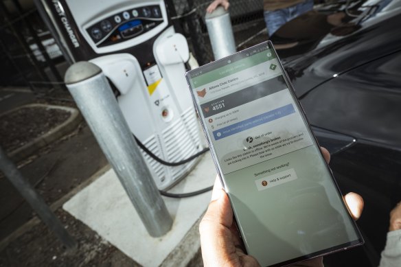 Ajo Pathmanathan at an out-of-order EV charging station.