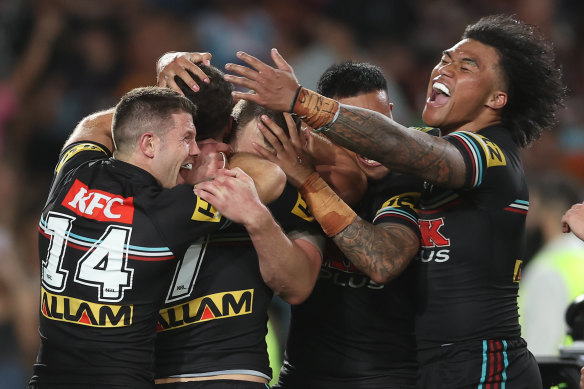 Penrith players celebrate Nathan Cleary’s match-winning try on Sunday night.