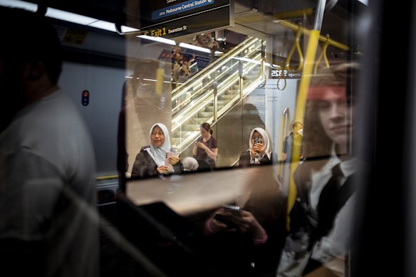 Train passengers at Anzac station.