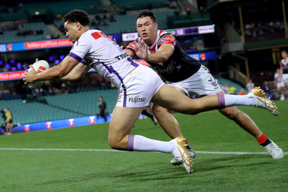 Xavier Coates scores one of his three tries against the Roosters.