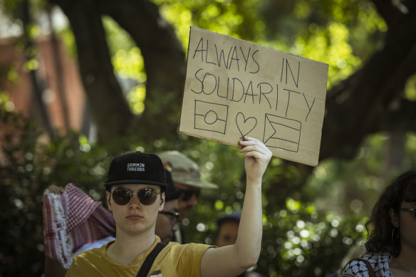 Solidarity always: A protester at Sunday’s pro-Palestinian rally in Melbourne.