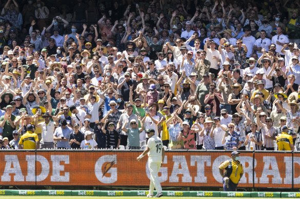Scott Boland is cheered by Bay 13 on the final day of the Boxing Day Test.