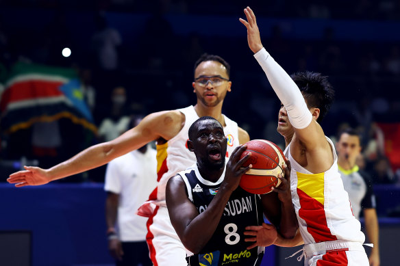 South Sudan captain Kuany Kuany playing against China at the FIBA World Cup.